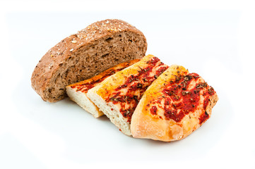 Baguette and bread on white background