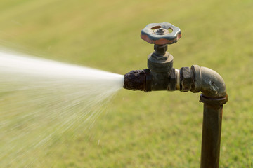 Closeup of water running from outdoor park