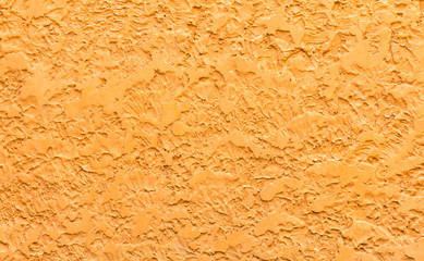Fototapeta premium Background or texture of an orange wall.