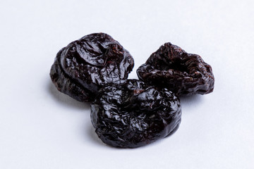 prunes on white table