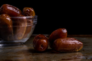 dried dates on steel plate