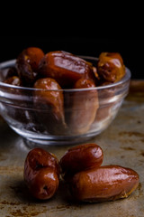 dried dates on steel plate