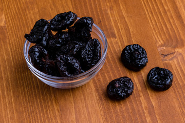 prunes on wooden table