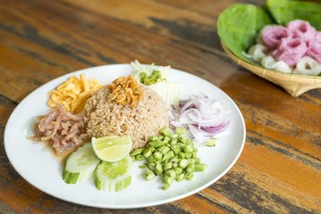 Mixed Cooked Rice with Shrimp Paste Sauce delicious Thailand's national dishes,  in Thai call  - Kao Cluk Ka Pi  - obrazy, fototapety, plakaty