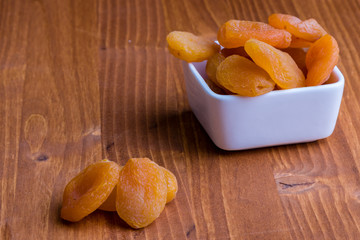 dried peach on wooden table
