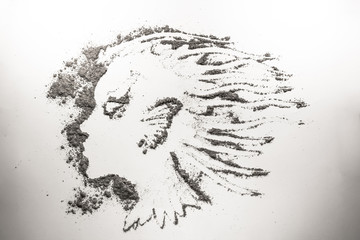 Fantasy girl head drawing in dust, ash, sand, dirt