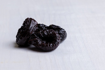 prunes on white table
