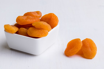dried peach on white table