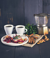 Cherry pie and a cup of coffee. Rustic style. Berry pie. Homemade cherry pie with flaky crust, cup of coffee, bowl with cherries