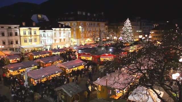 Christmas market in Bolzano in Walther Square with lights and decorations