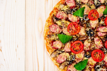 Pepperoni Pizza with Sausage, Cheese, Mozzarella, Olives and Bas