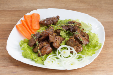 Chicken liver cooked with onions, lettuce and spices