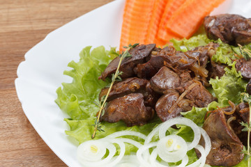 Chicken liver cooked with onions, lettuce and spices