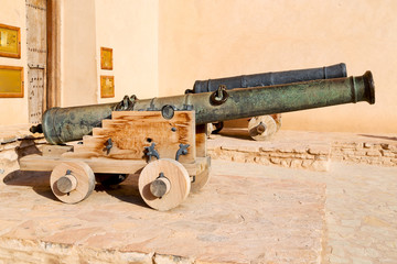 in oman muscat the old castle and cannon near the wall