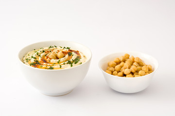 Hummus in bowl isolated on white background