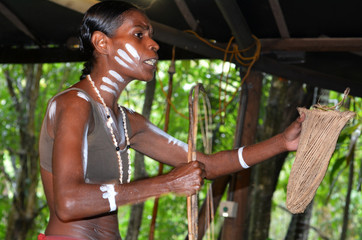 Fototapeta na wymiar Yirrganydji Aboriginal woman explain about the home tools made b