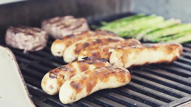 turning around some sausages and tenderloins. summer feelings. color edit