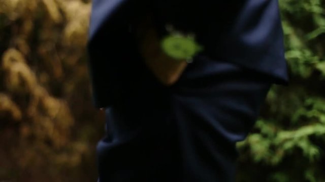 man with hand in pocket 