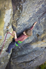 A bold child is climbing.