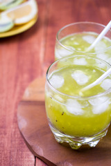 Drink from a kiwi and a lemon