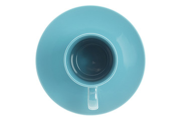 mug and saucer on blue
