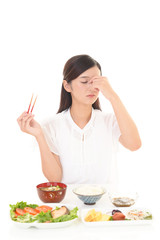 食欲不振の女性