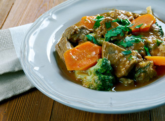  German traditional beef stew with carrots, dark beer