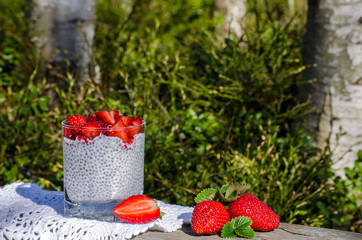 Chia pudding with strawberries on the table