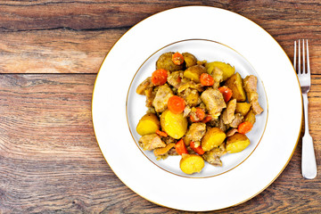 Stewed Quince with Potatoes, Carrots, Onions and Meat