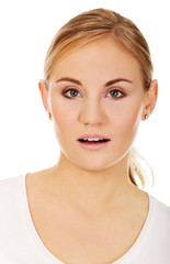Obraz premium Young shocked woman with open mouth