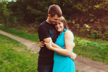 Joyful embracement of the husband and wife