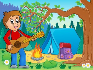 Boy guitar player in campsite theme 2