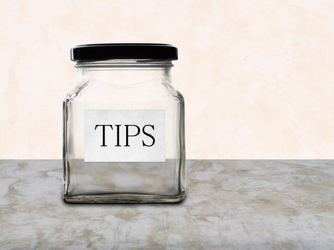 Empty tips jar on counter. No money.