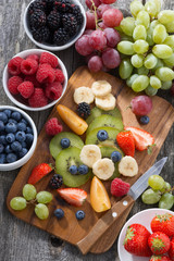 ingredients for fruit salad, vertical, top view