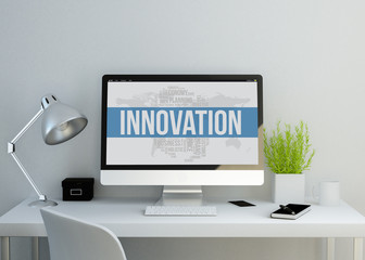 modern clean workspace with innovation keyworkd on screen