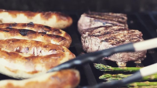 turning around some sausages and tenderloins. summer feelings. color edit