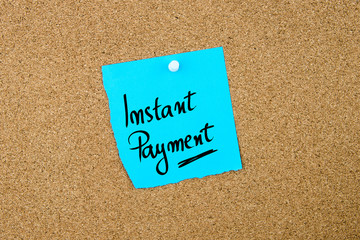 Instant Payment written on blue paper note - 110074576