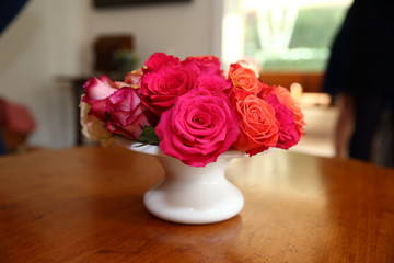 roses/ bunch of red and orange roses om a vase