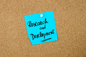 Research and Development written on blue paper note