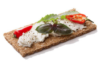Bread crisp with pepper,soft  cheese and basil