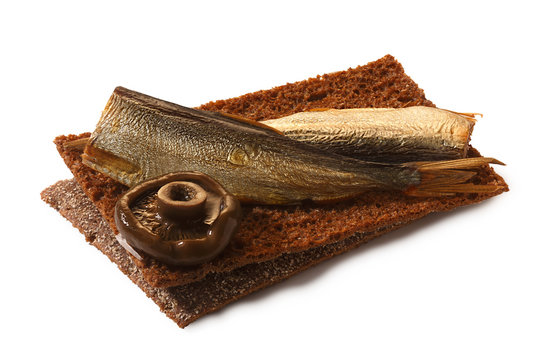 Bread crisp with smoked sprats, soft cheese and mushroom