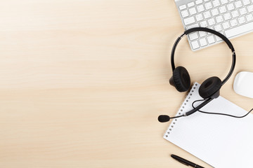 Office desk with headset and pc