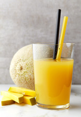 glass of melon and mango juice