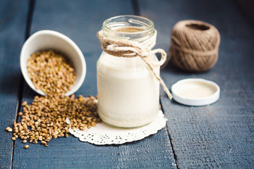 vegan fresh milk from hemp seeds in a glass jar, clean eating