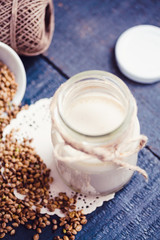 vegan fresh milk from hemp seeds in a glass jar, clean eating