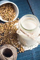 vegan fresh milk from hemp seeds in a glass jar, clean eating