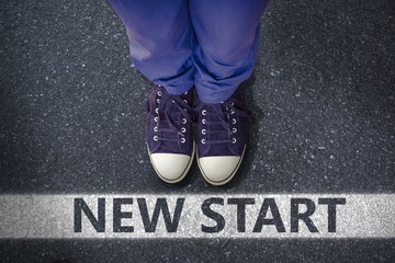 Composite image of low section of man standing on hardwood floor