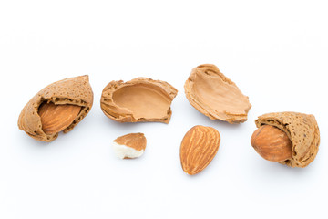 Group of almond nuts. Isolated on a white background.