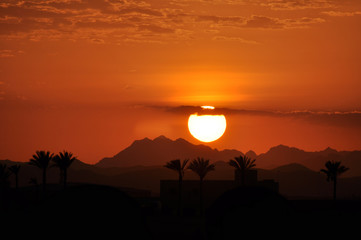 The sunset over the mountains of the Sinai Peninsula Sharm El-Sheikh . Egypt 