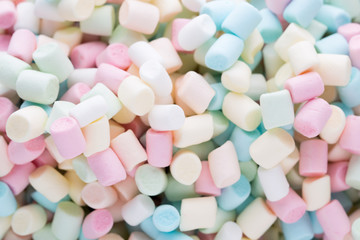 Background or texture of colorful mini marshmallows.